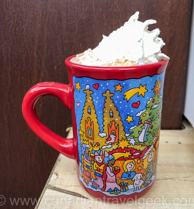Hot chocolate and cream in a reusable German Christmas Market mug